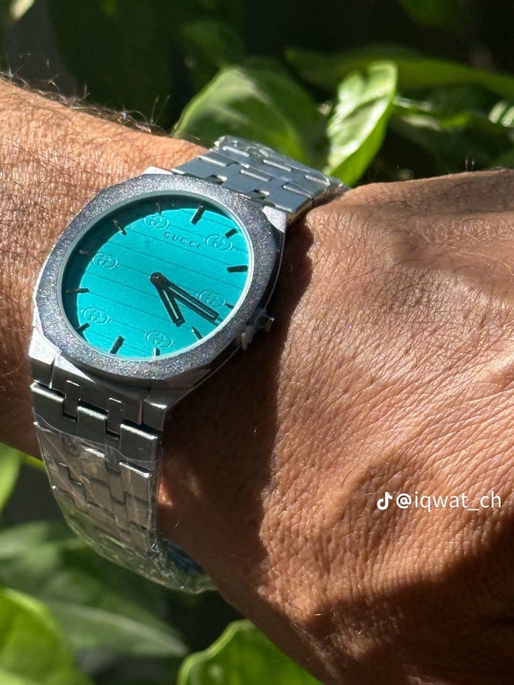 gucci 25h ساعة