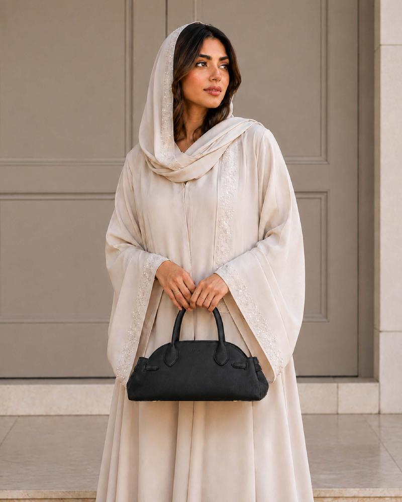 شنطة ميا النسائية جلد بلون أسود