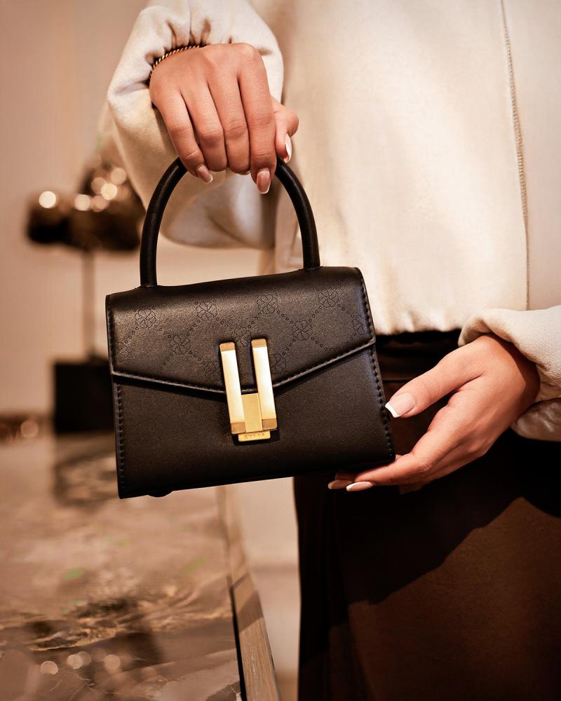 Stylish small black leather bag