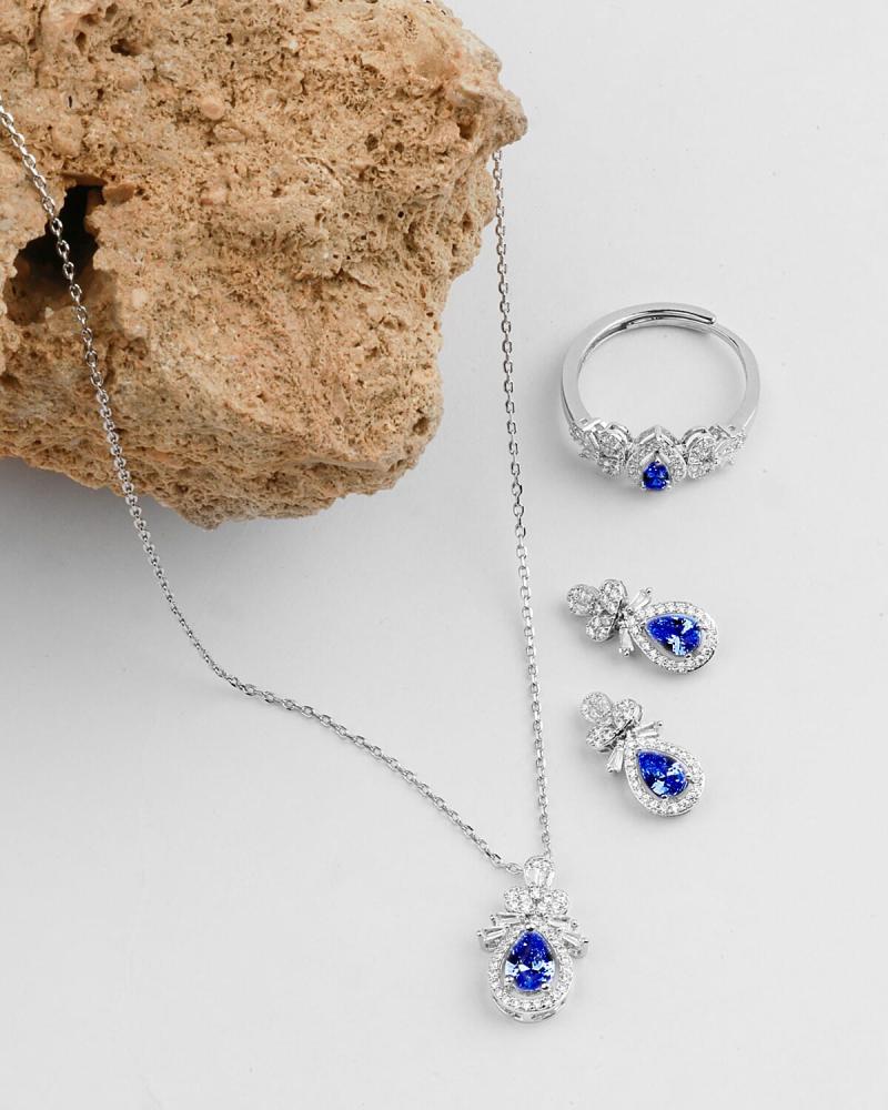 A delicate women's accessory set in silver and blue