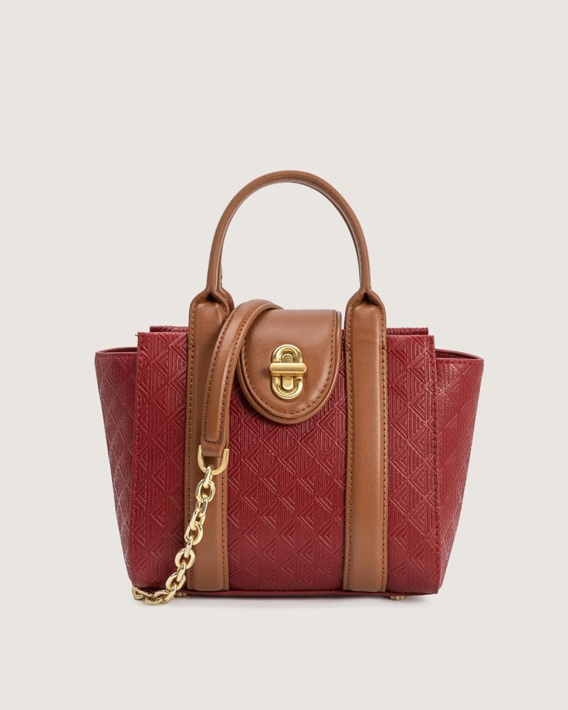 Women's bag with a practical design and a suitable size for everyday use, in a burgundy color.