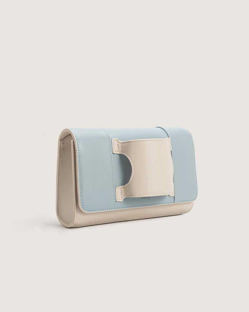 Women's leather handbag in blue and beige