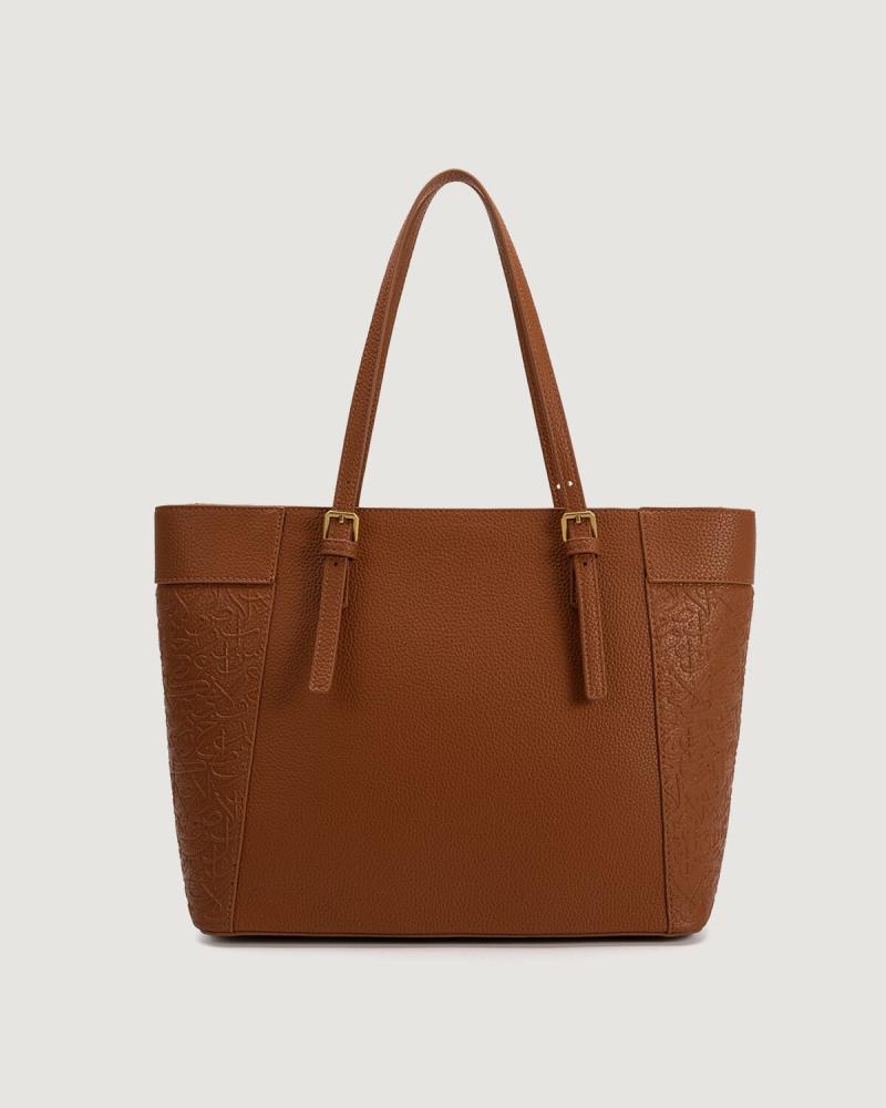 Women's handbag with a practical design in brown