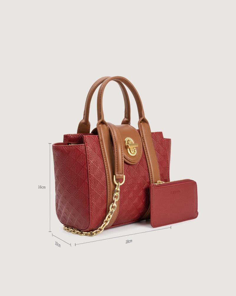 Women's bag with a practical design and a suitable size for everyday use, in a burgundy color.