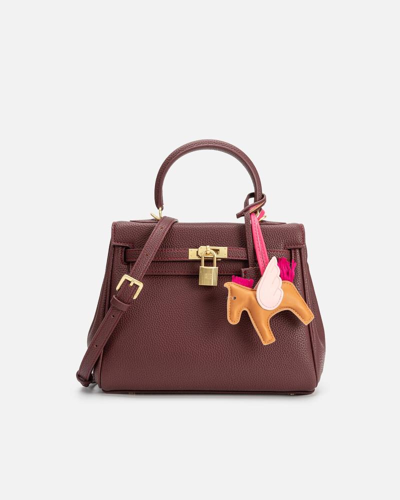 A women's bag that embodies modern elegance in a burgundy color.