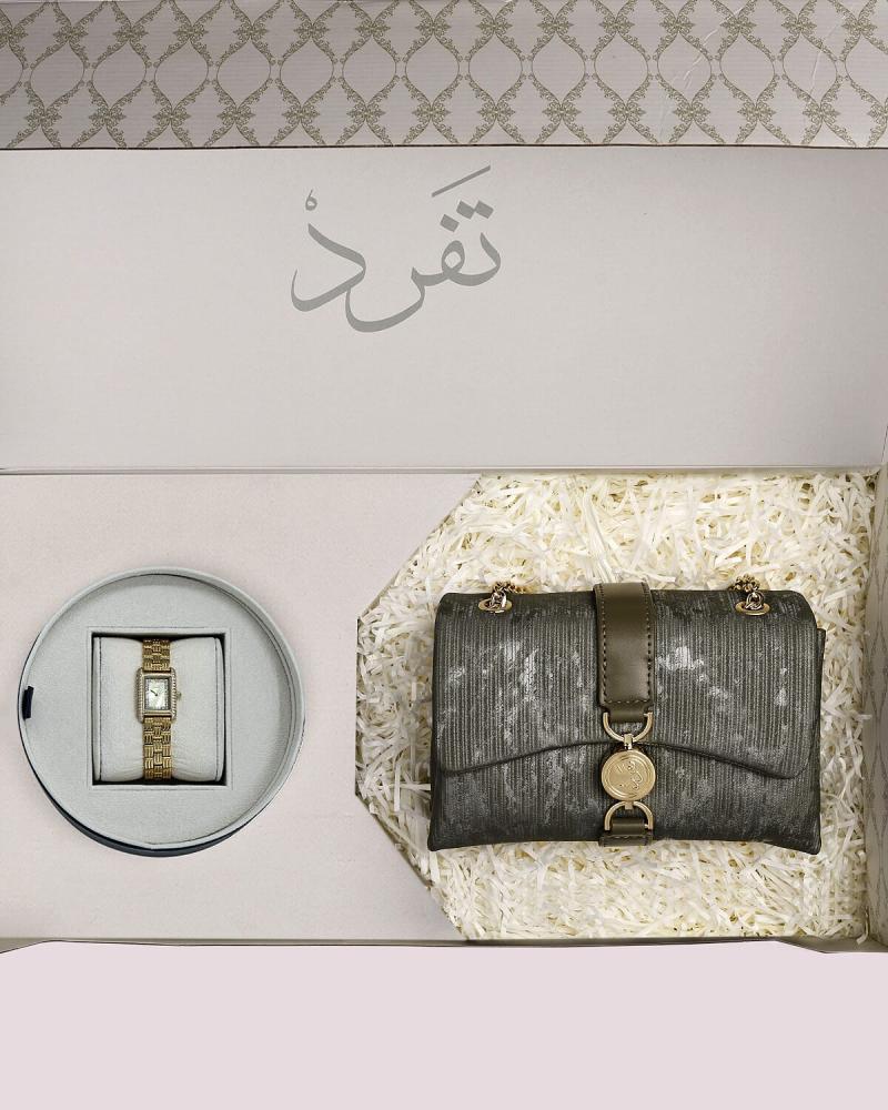 هدية نسائية ساعة وشنطة بتصميم ملفت