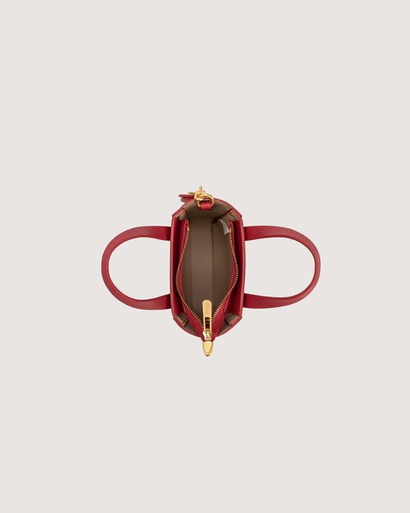 Women's handbag in a small burgundy color, perfect for everyday use.