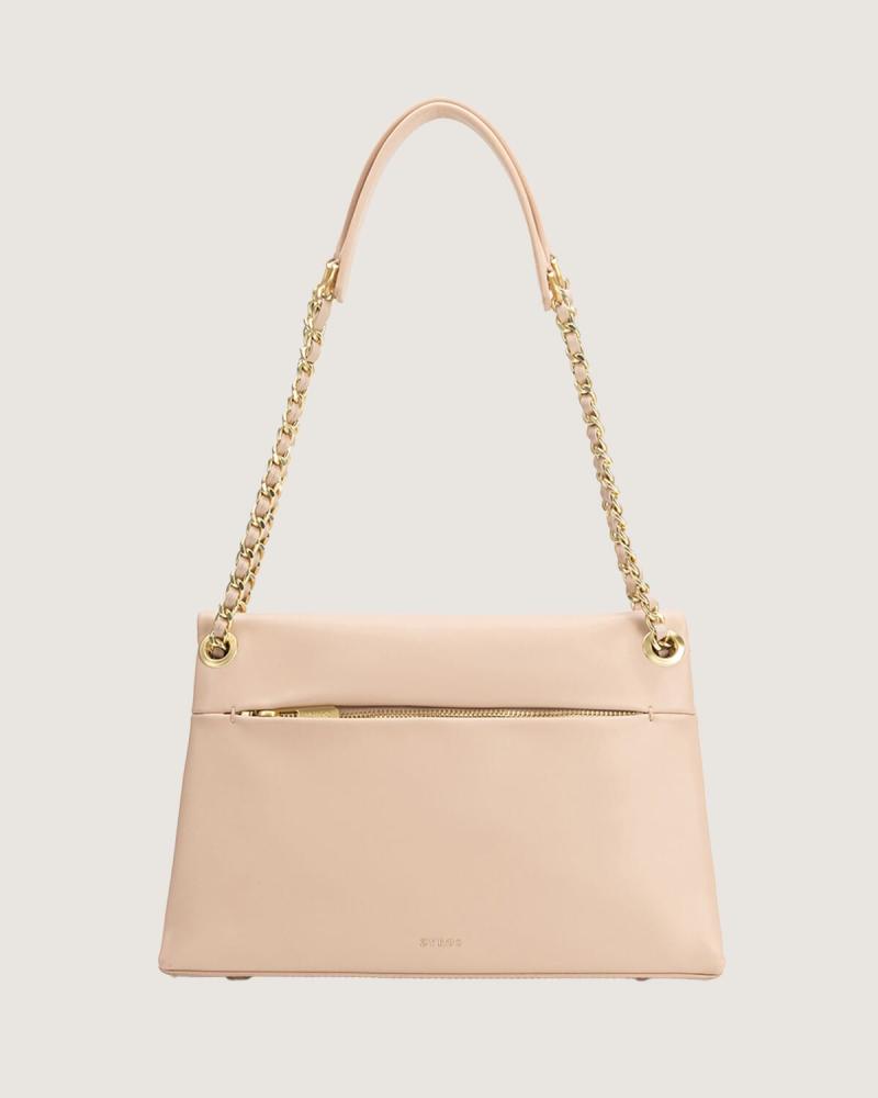 Large women's leather handbag in beige