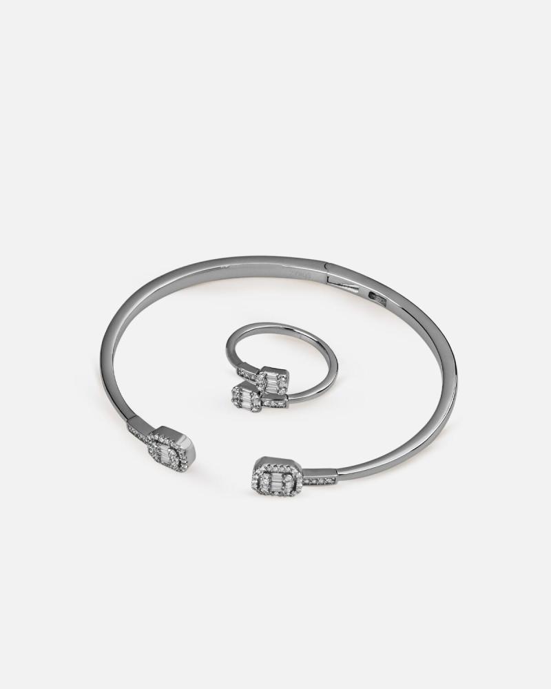 A distinctive silver bracelet and ring set