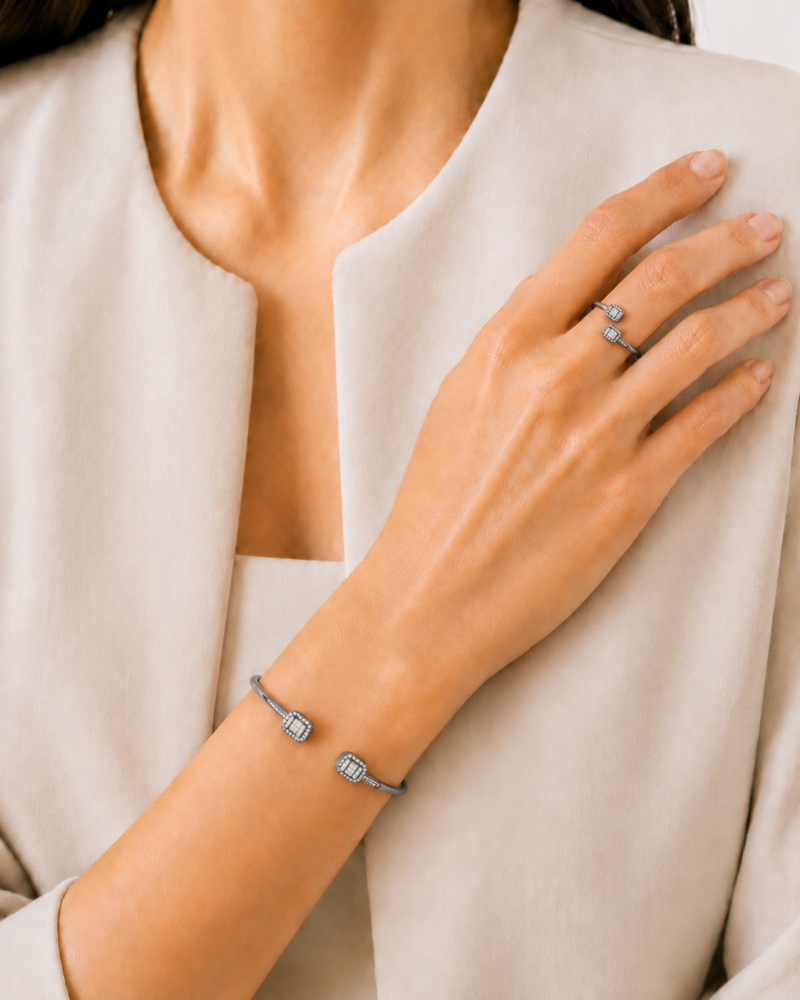 A distinctive silver bracelet and ring set