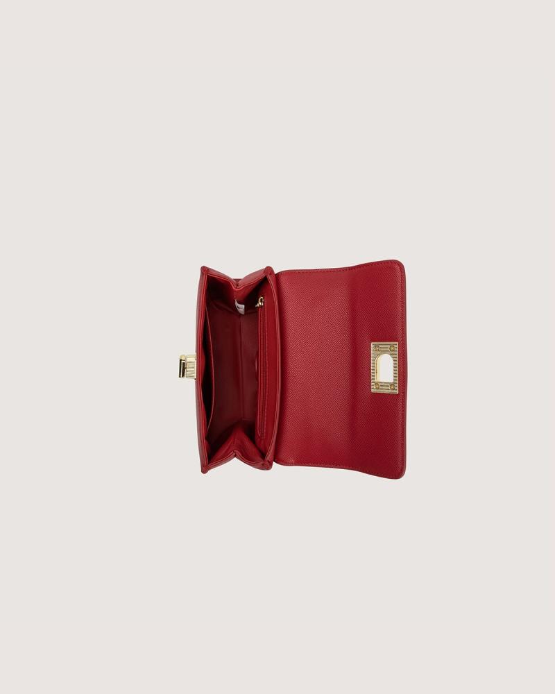 شنطة نسائية بمقاس متوسط بلون عودي