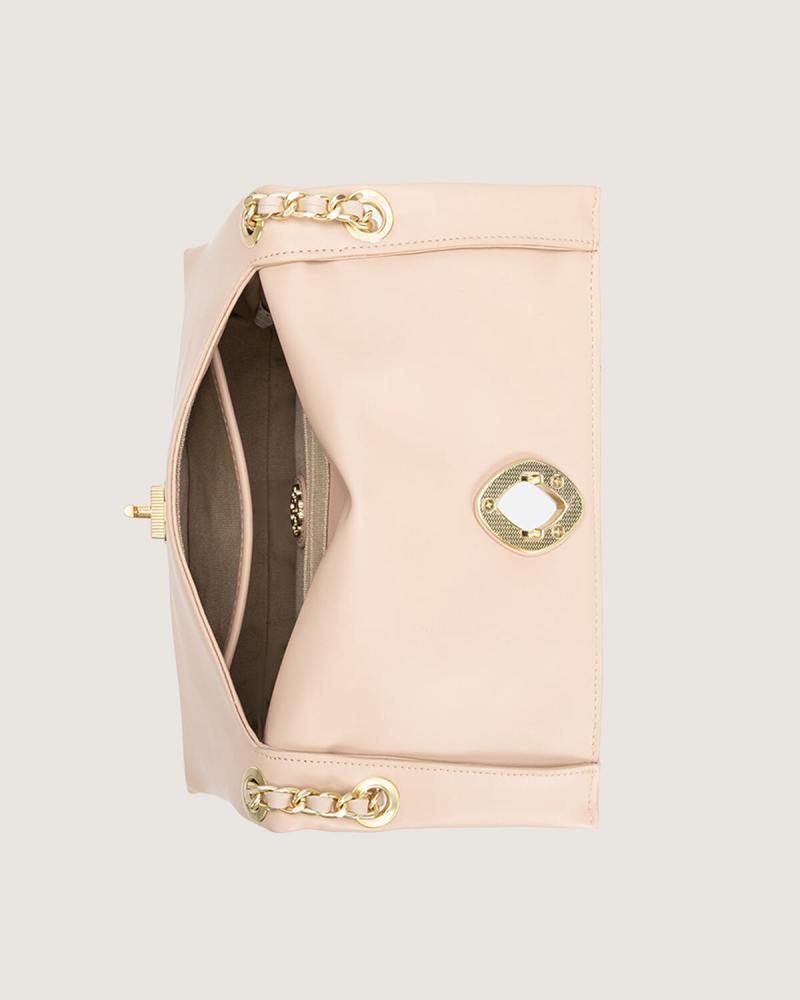 Large women's leather handbag in beige