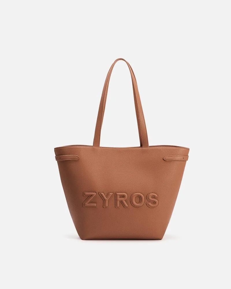 A spacious bag with a practical design in brown.