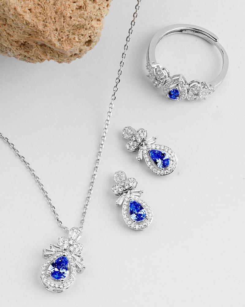 A delicate women's accessory set in silver and blue