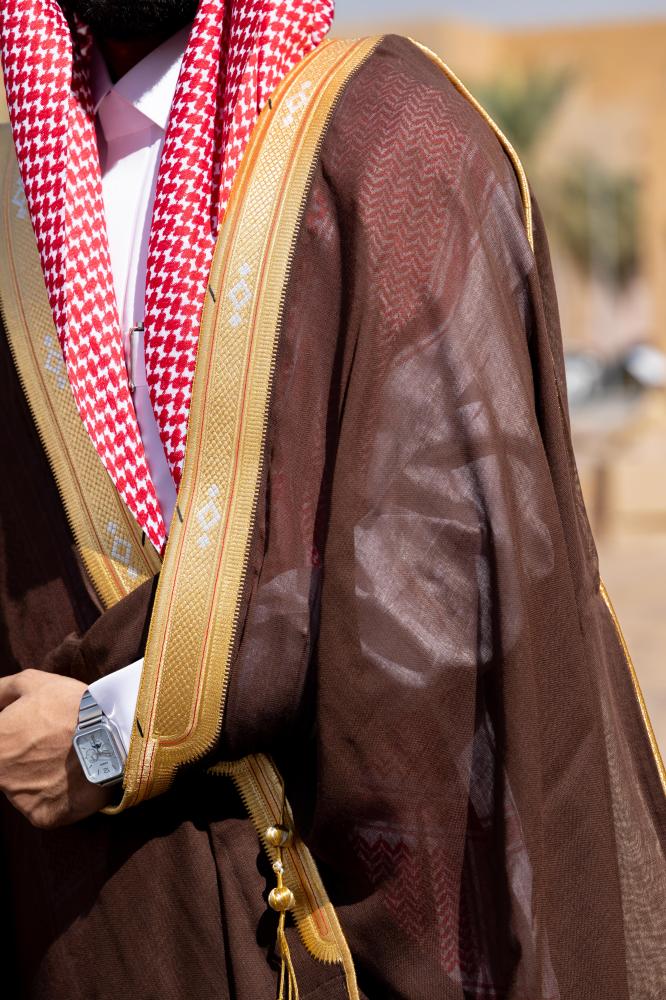 مشلح رجالي متوسع عريض
