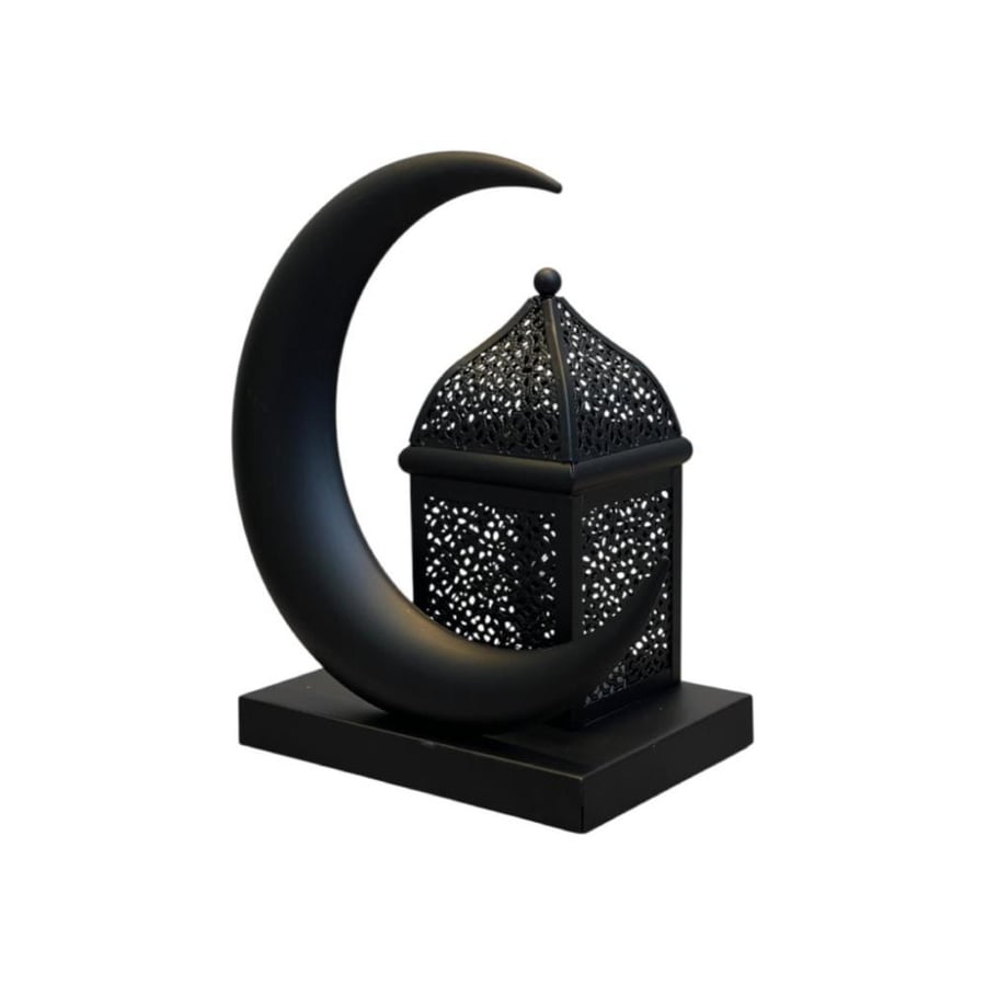 Ramadan lantern made of metal with a black crescent