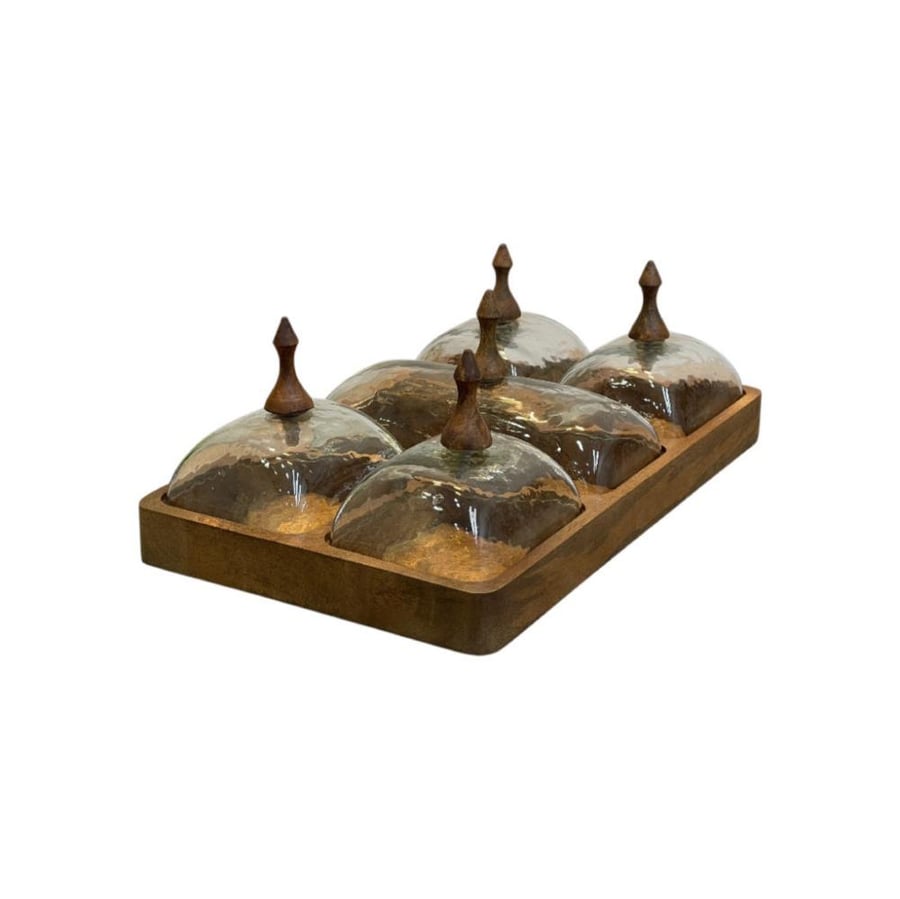 A five-sided wooden date tray set with glass covers