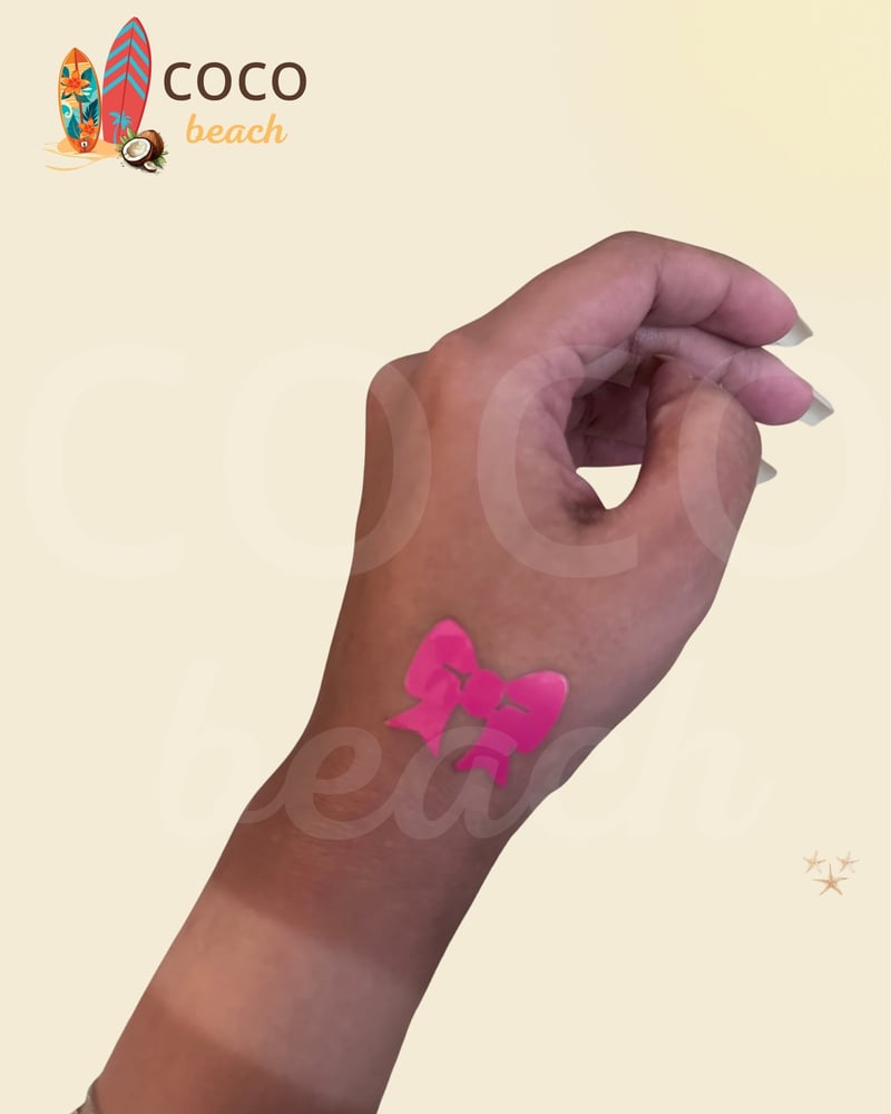 استكر تان شكل فيونكة لرسمة أنثوية رقيقة على البشرة - كوكو بيتش