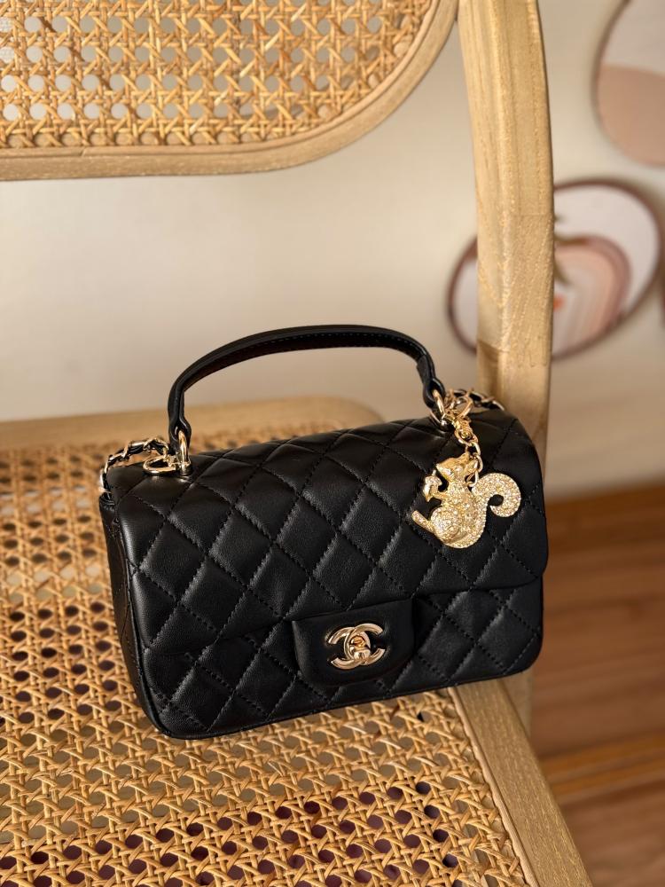Chanel Quilted Mini Flap Bag With Charm