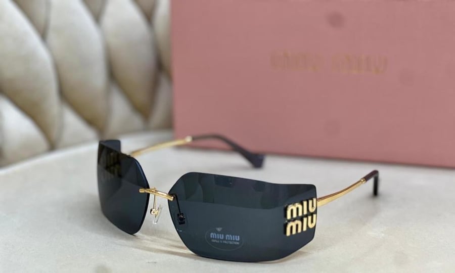 MIU MIU Rimless Sunglasses