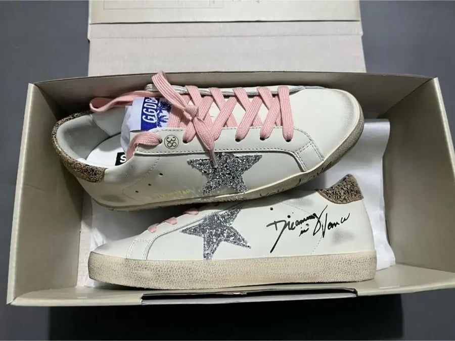 Golden Goose Super-Star with silver glitter star and leopard print heel tab
