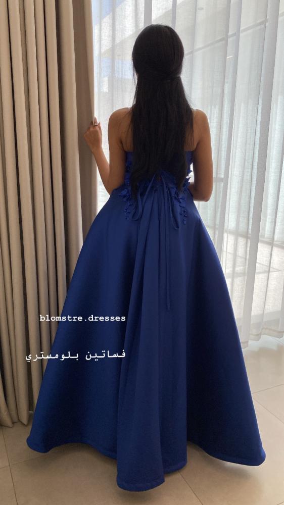 فستان سهرة ازرق بورد من الاعلى