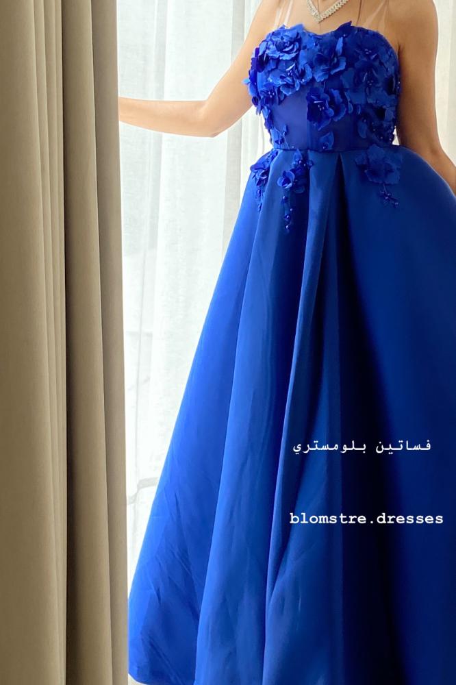فستان سهرة ازرق بورد من الاعلى