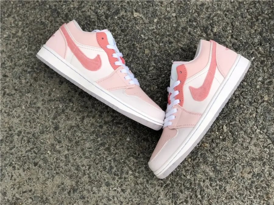 Air Jordan 1 low the mighty swooshers pink
