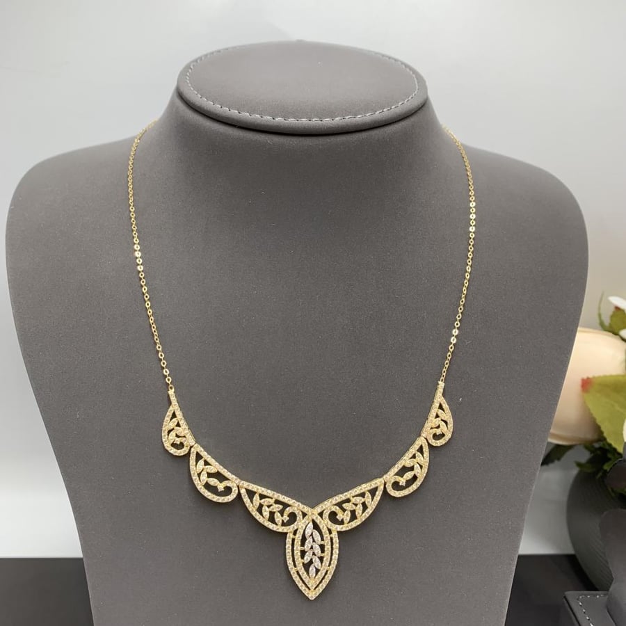 Diamond design mesh set, 18 karat, weight 13.5