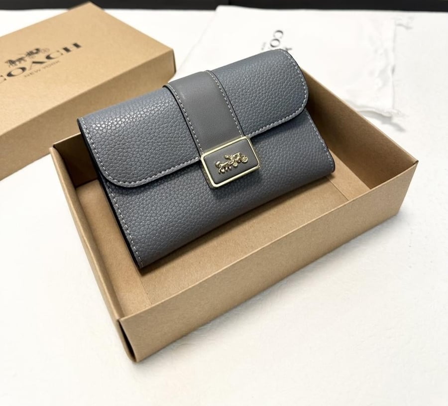 محفظه كوتش coach