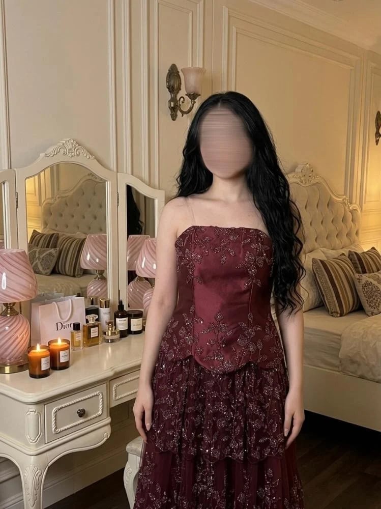 فستان سهرة طويل باللون العنابي