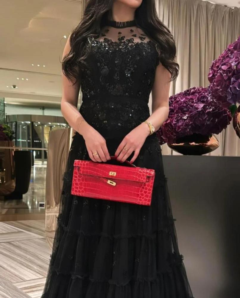 فستان سهره اسودف فخم تل و كلفه من متجر جوهره FR  D