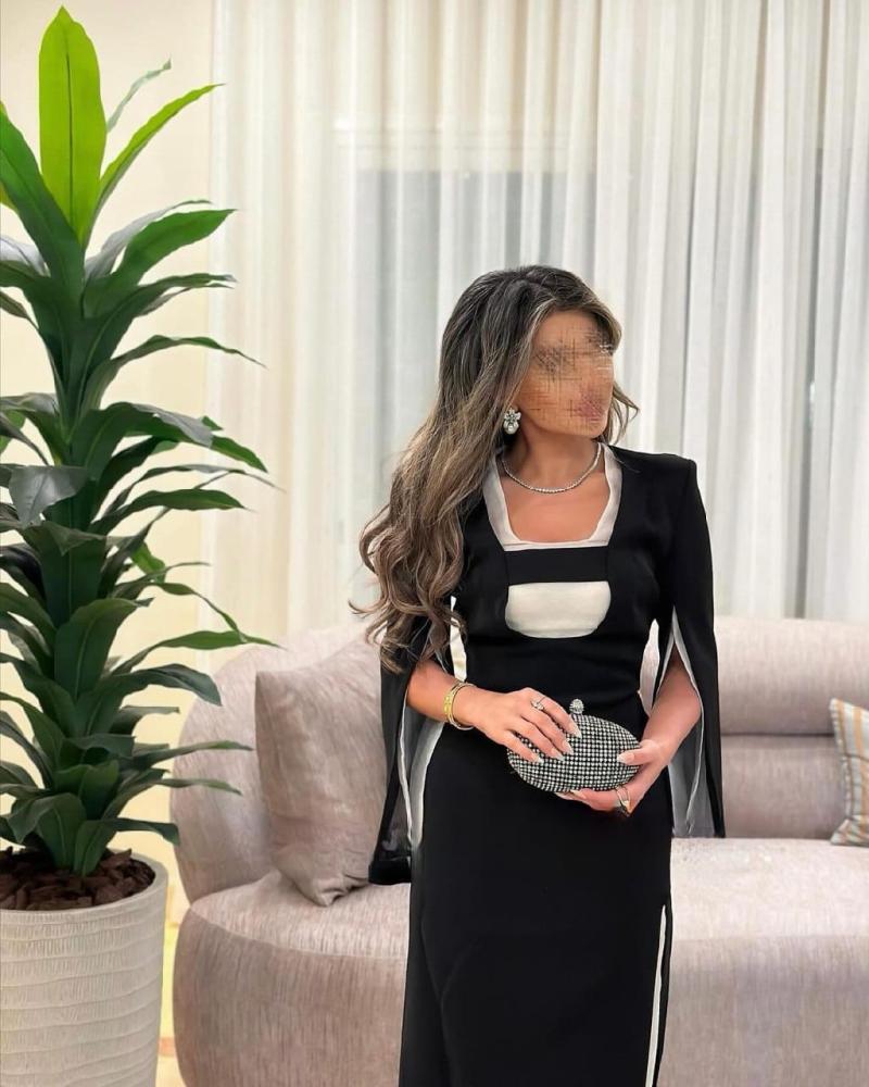 فستان ماكسي اسود و ابيض مع اكمام واسعه مفتوحه