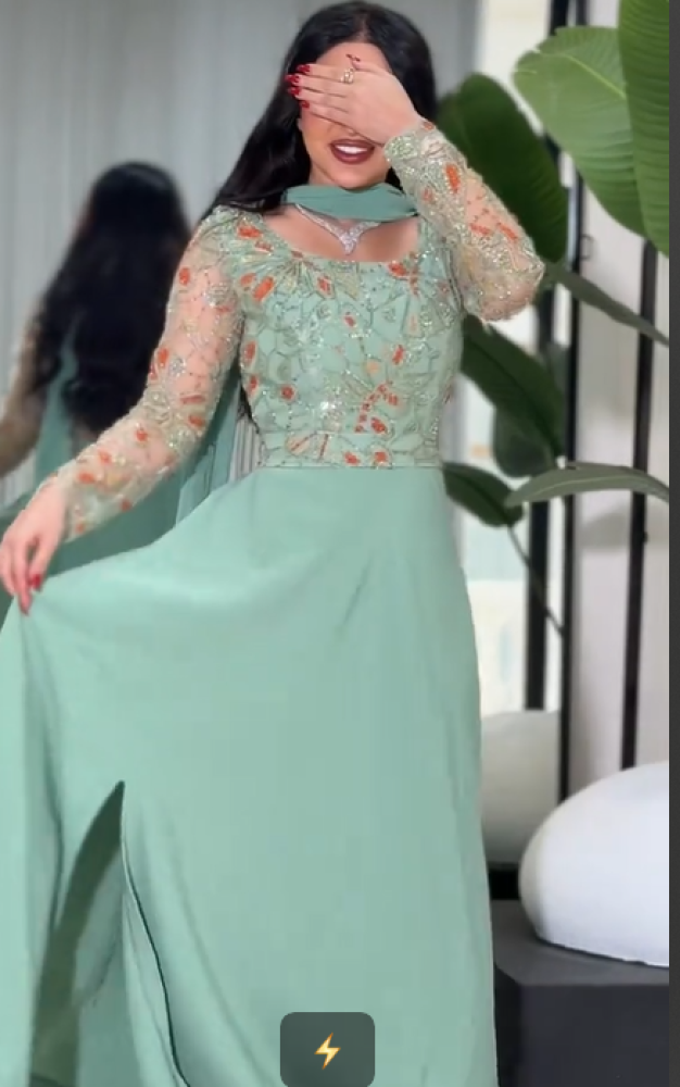 Evening dress in the color Tefni, material Barbie. Hand embroidery from Jewelery BS store