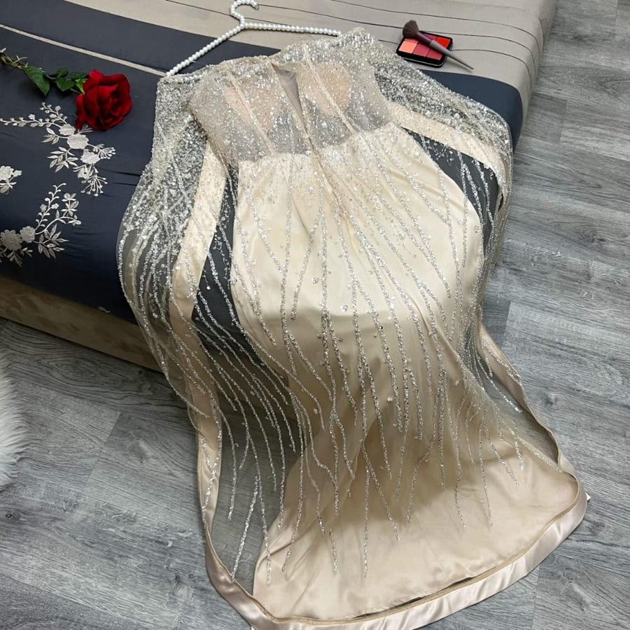 فستان سهره اللون بيج  تفته استرتش اصلي درجه اولى  بتطريز يدوي راقي   قماش شك سهره TR