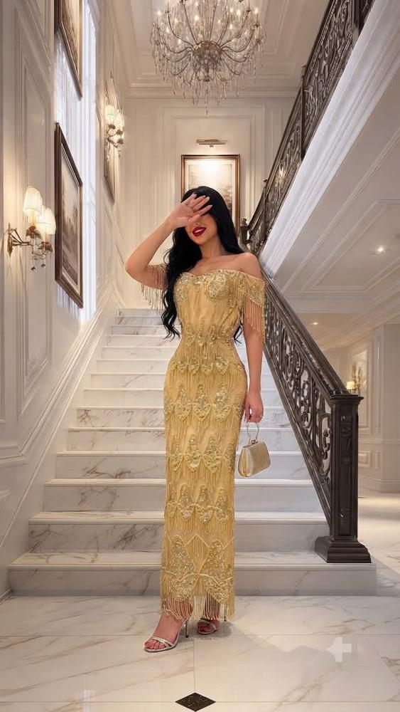 فستان سهره  اللون  ذهبي  كلفه سهره هدب خرز وبطانه باربي من  متجر جوهره LF