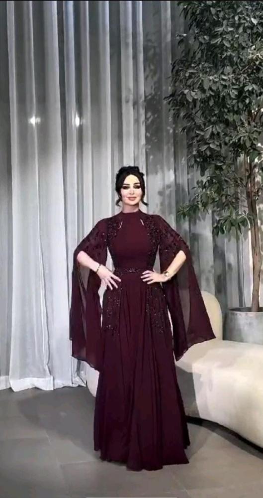 فستان سهره اللون برغندي  الخامه جورجيت  تطريز يدوي من متجر جوهره MA