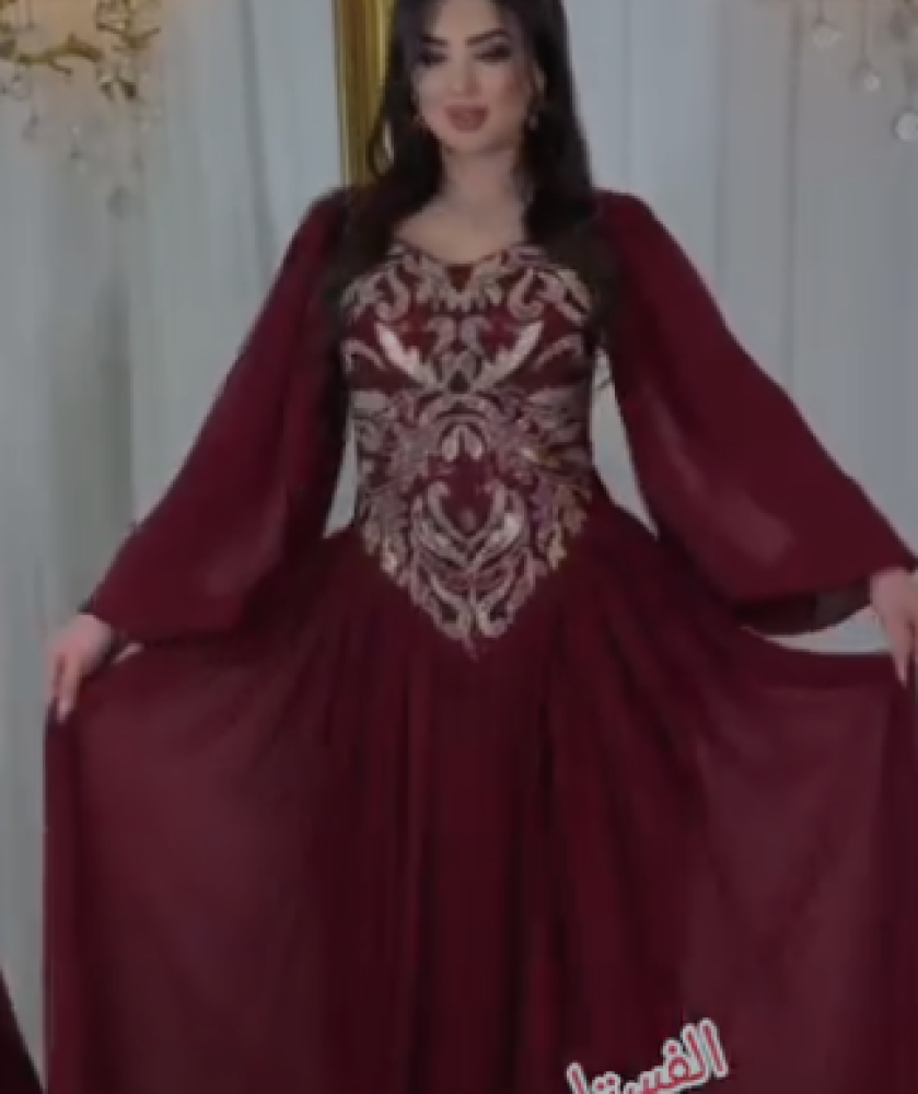 فستان سهره اللون نيلي و عودي  الخامه جورجيت تطريز يدوي راقي  ا من متجر جوهره  MA