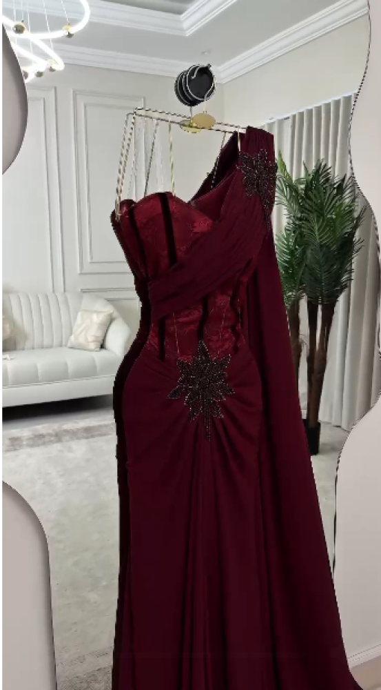 فستان سهره اللون  برغندي  وتطريز يدوي  من متجر  جوهره  MN