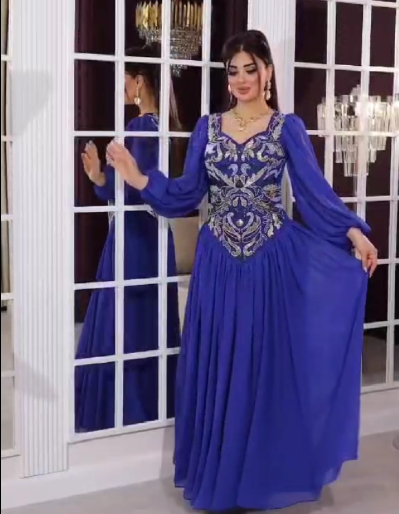 فستان سهره اللون نيلي و عودي  الخامه جورجيت تطريز يدوي راقي  ا من متجر جوهره  MA