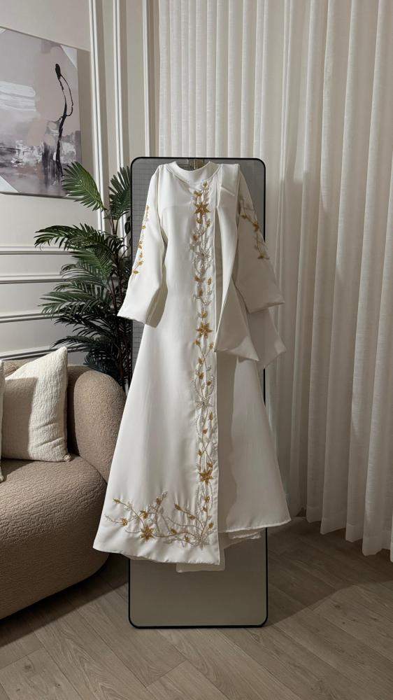 White color jalabiya, fabric type Barbie, hand embroidery from Jewel store QU FR