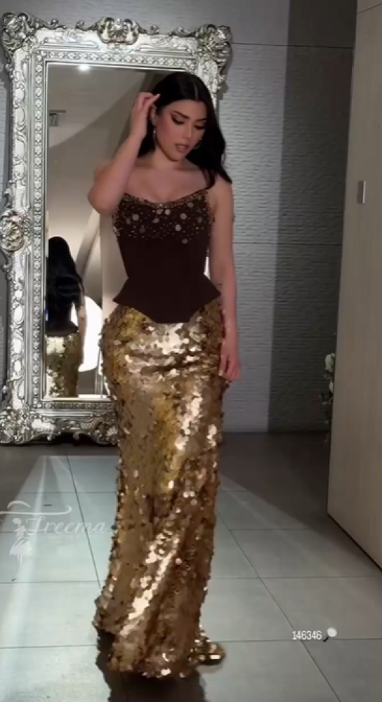 فستان سهره  اللون بني على ذهبيترتر وباربي وتطريز يدوي   من  متجر جوهره MN