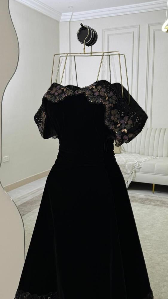 Dress in black color, fabric: taffeta, and embroidery from Jewelry Store MN