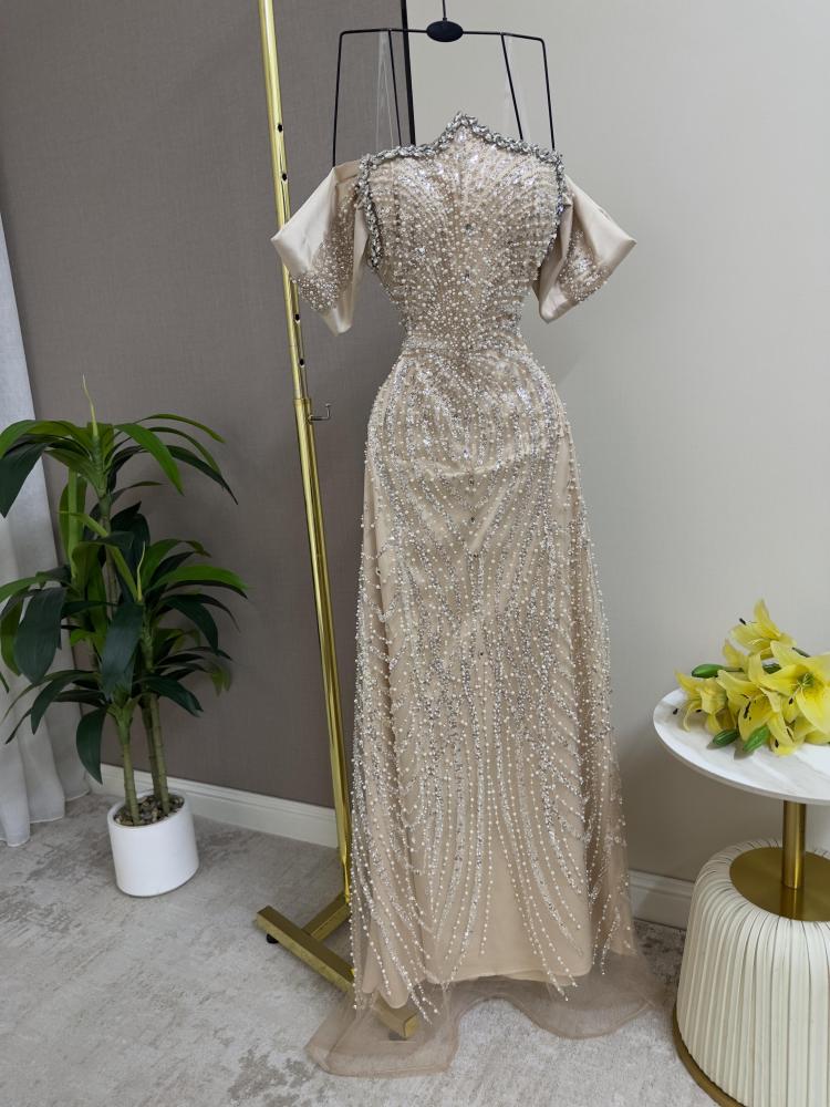 Evening dress in beige color, luxurious embroidery with beads and elegant rhinestones, with a soft lining, from Jouhara MN LV store