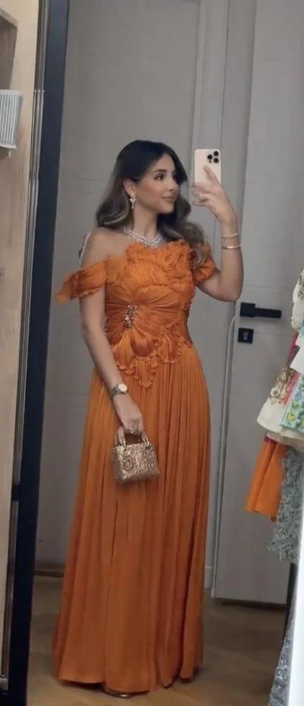 فستان سهره  اللون  برتقالي  اورانج   من  متجر جوهره JO D