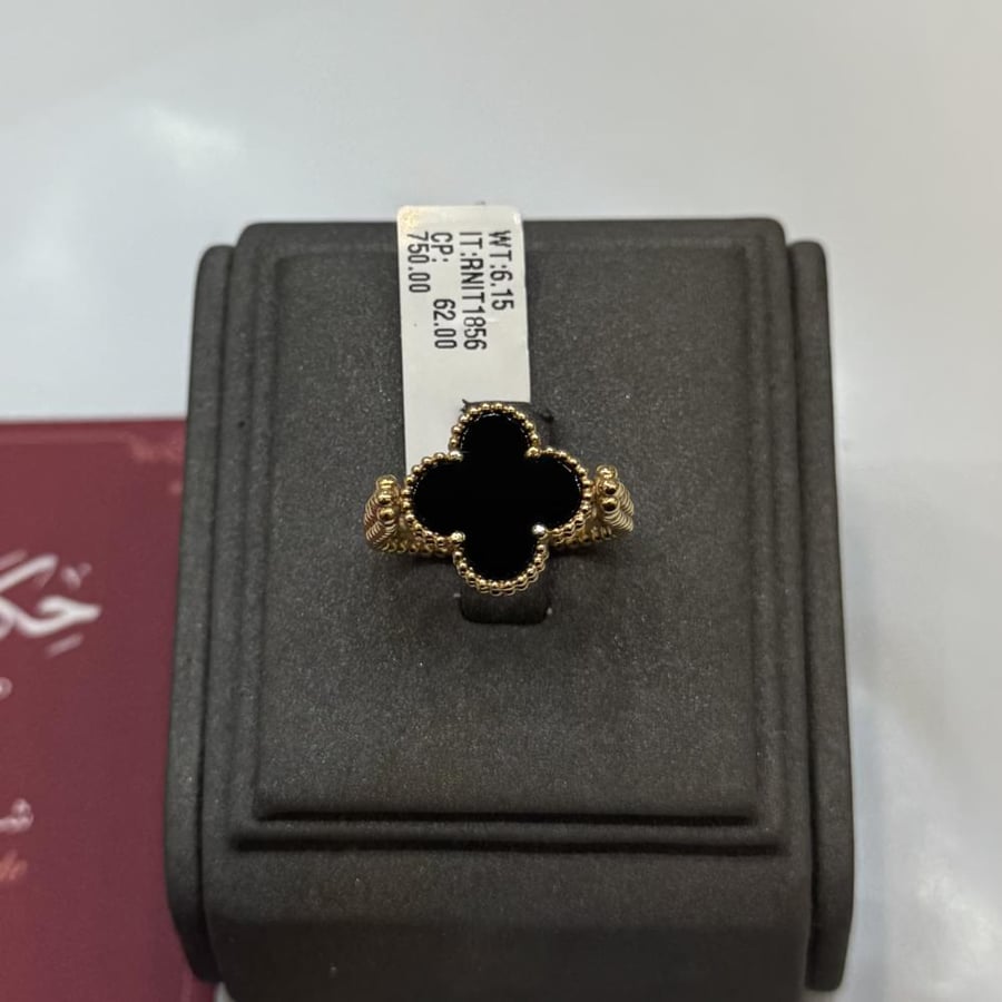 وجهين خاتم ذهب تصميم Van Cleef