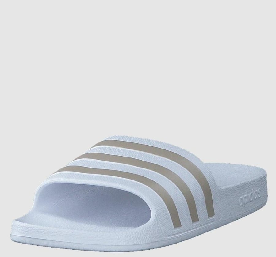 شبشب Adilette Aqua - أبيض سحابي / بلاتيني معدني / أبيض سحابي
