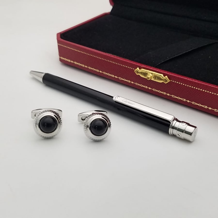 Pen and Cartier cuff