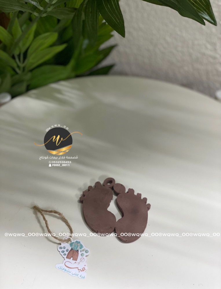 توزيعات احجار معطرة  ع شكل قدم بيبي مع ثيم وتغليف