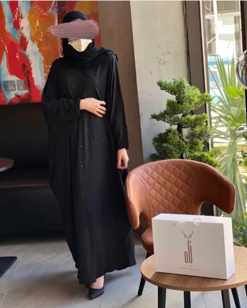 عباية لينن بتداخلات سادة وملونة